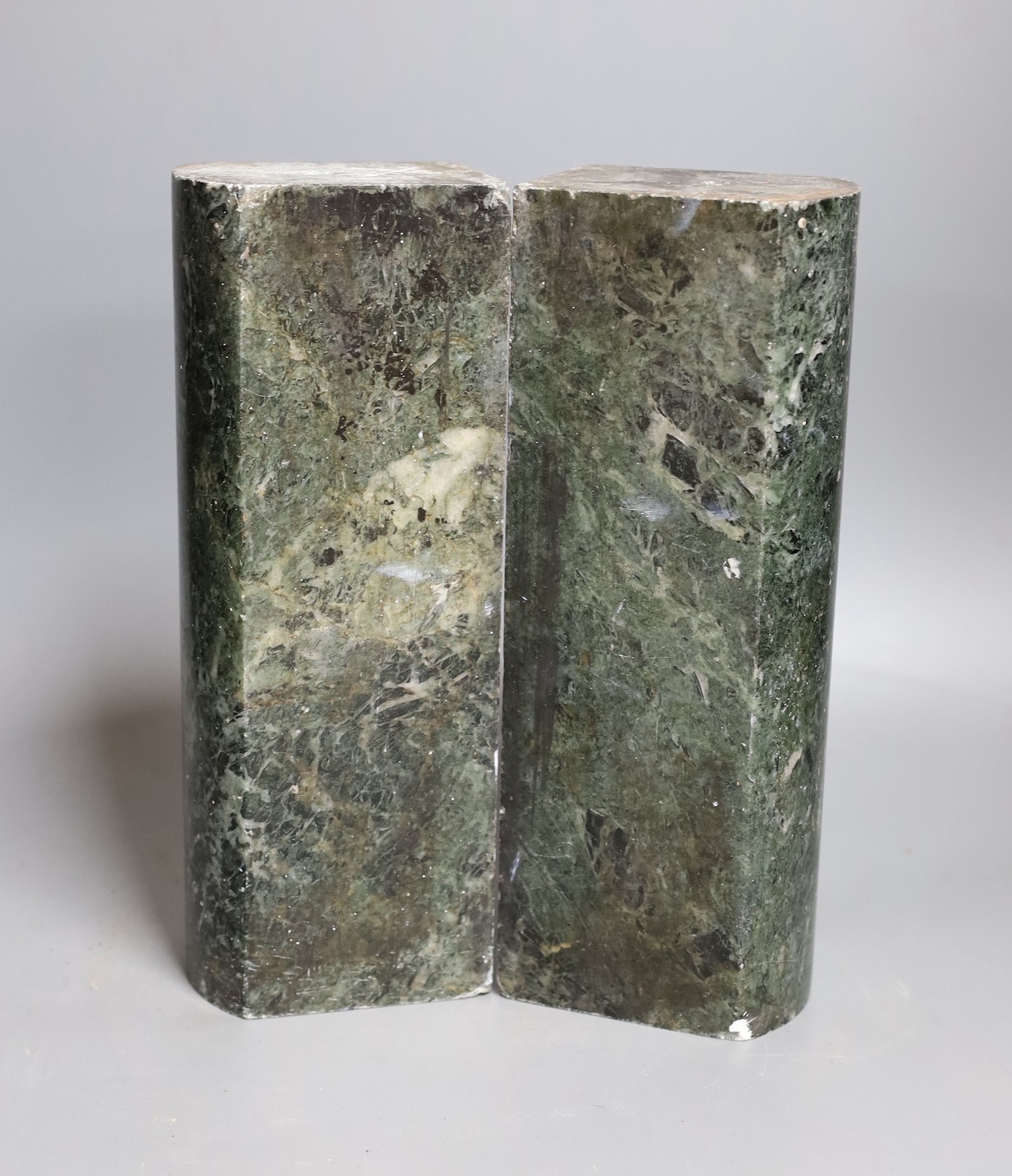 Two 19th century polished serpentine bar weights - combined 28 x 21cm